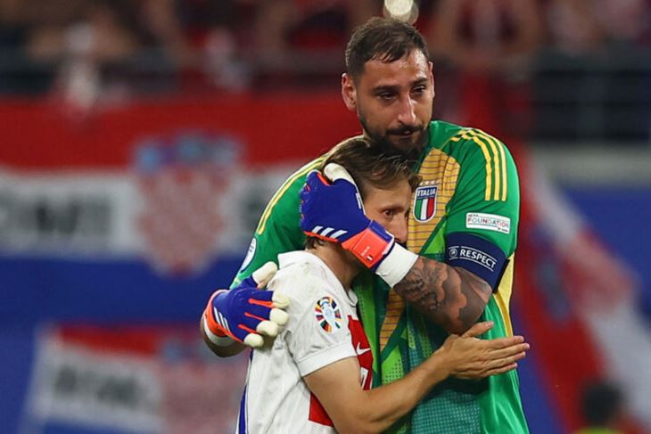 Luka Modrić i Gianluigi Donnarumma (Reuters)