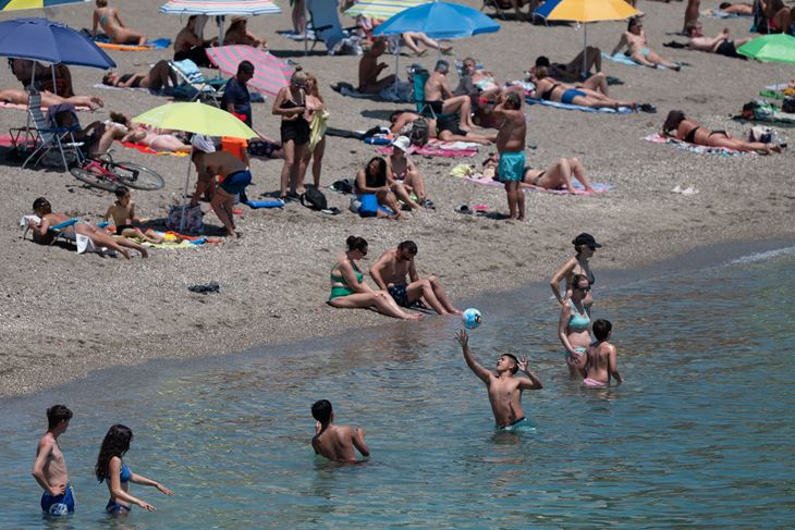 Plaža u Španjolskoj (Photo by JORGE GUERRERO / AFP)